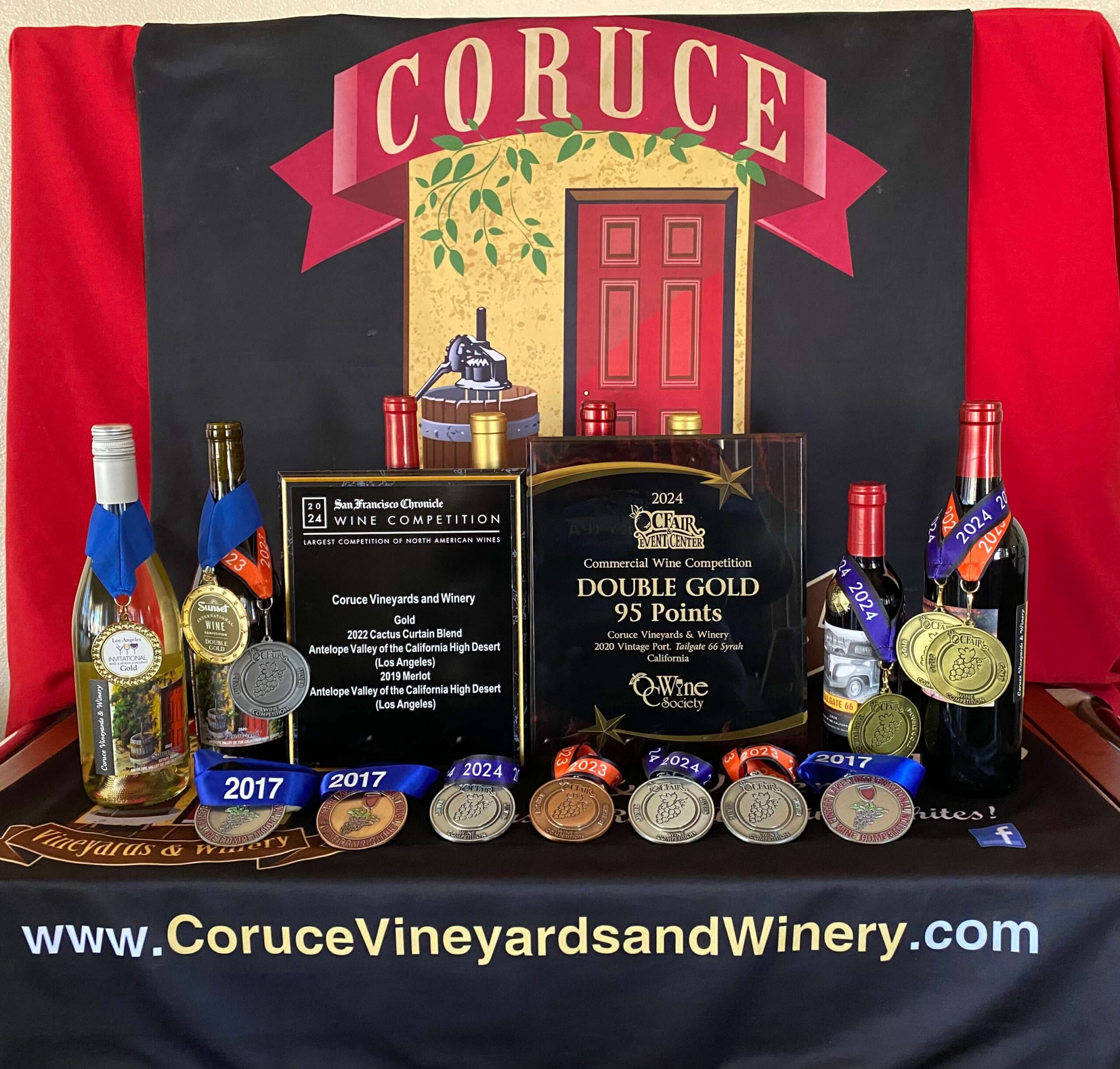 Tabletop full of medals won from wine competitions 2024